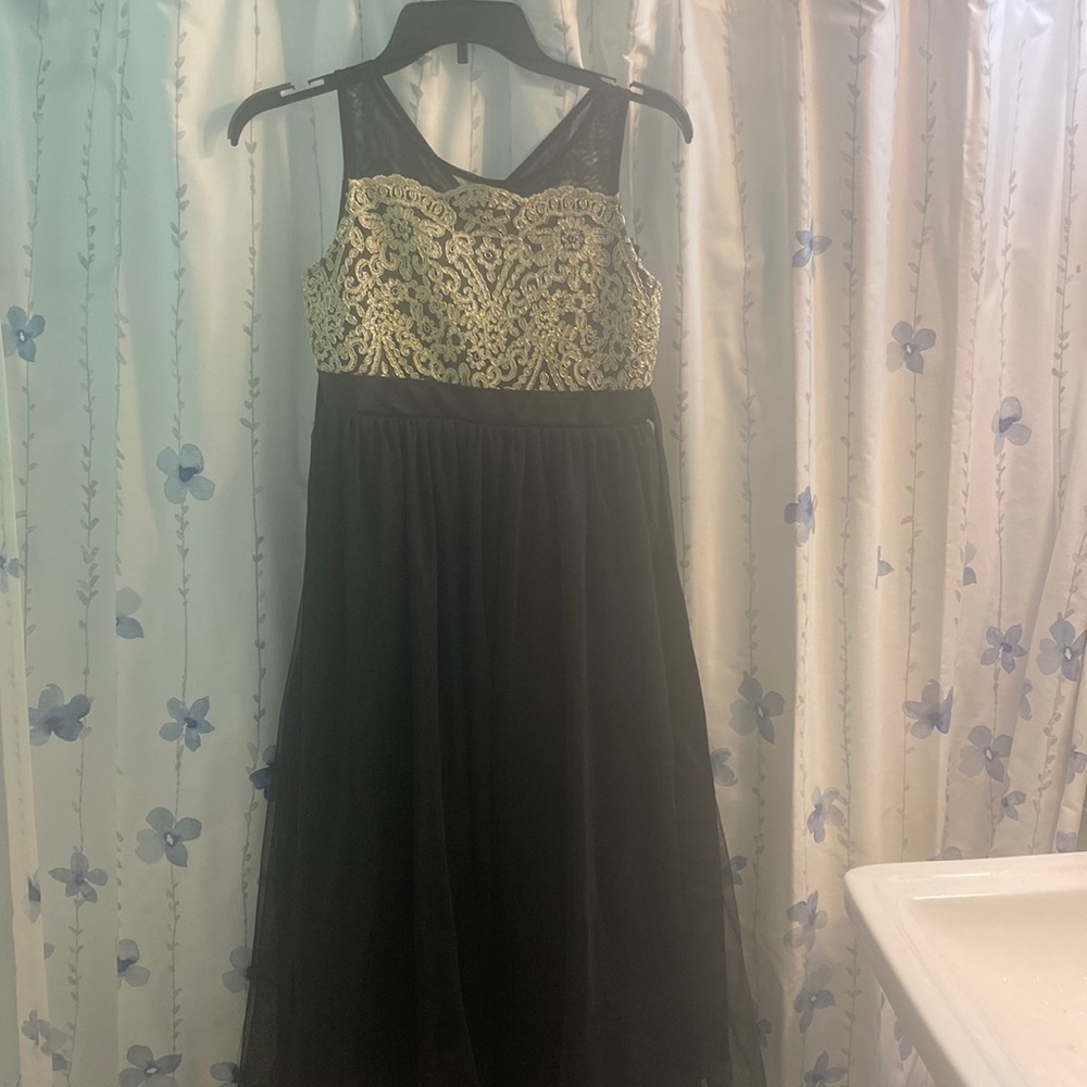 Black formal dress with gold design on top (Girls)